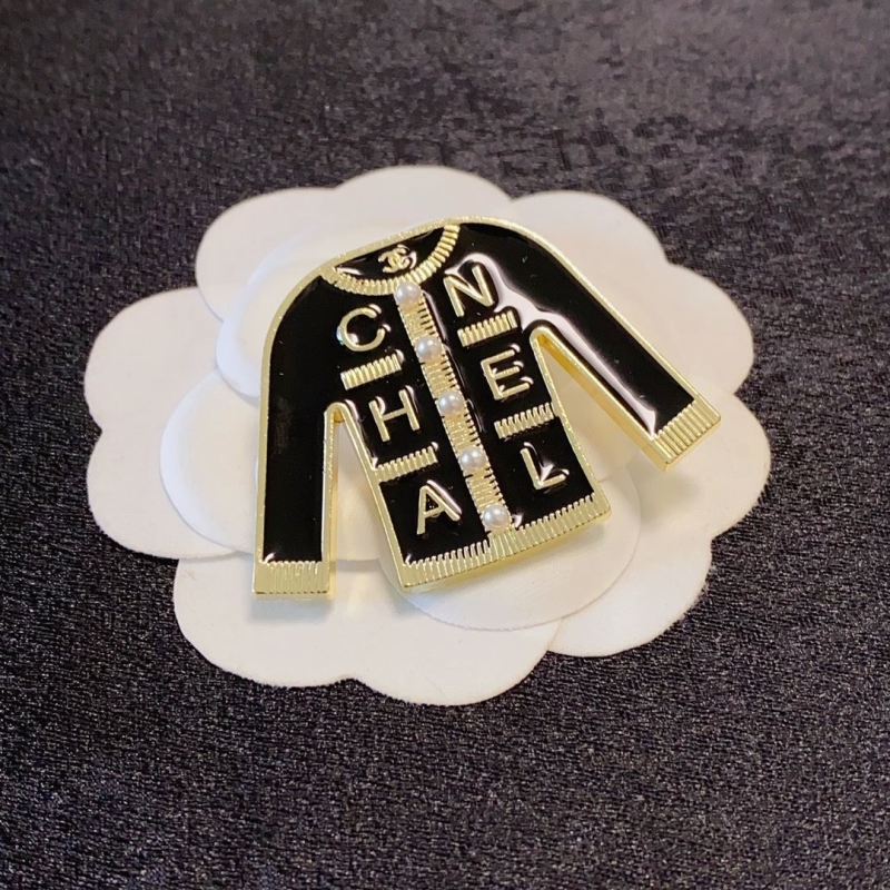 Ch**el brooches